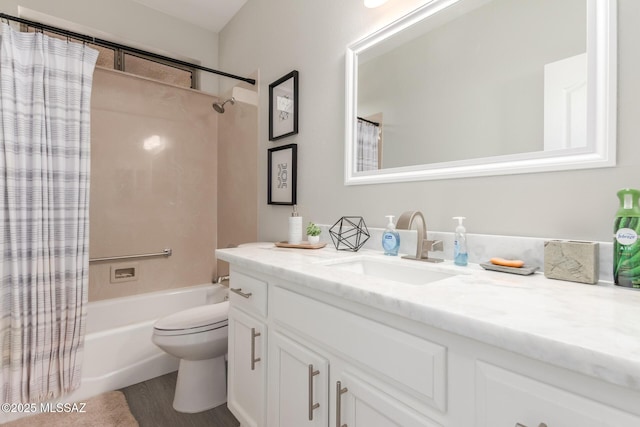 full bathroom featuring shower / bath combination with curtain, vanity, toilet, and hardwood / wood-style flooring