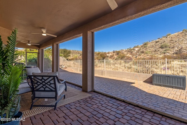 view of patio / terrace with ceiling fan