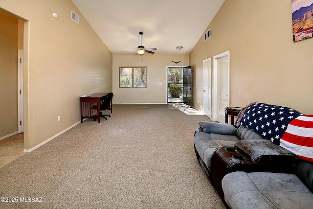 carpeted living room featuring ceiling fan and high vaulted ceiling