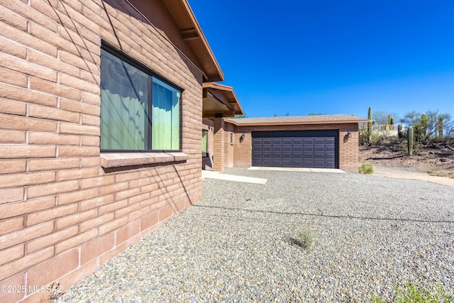 view of home's exterior with a garage