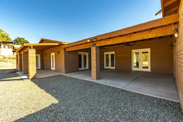 back of house featuring french doors, ceiling fan, and a patio area