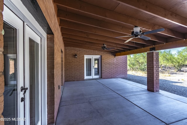 view of patio with ceiling fan and french doors