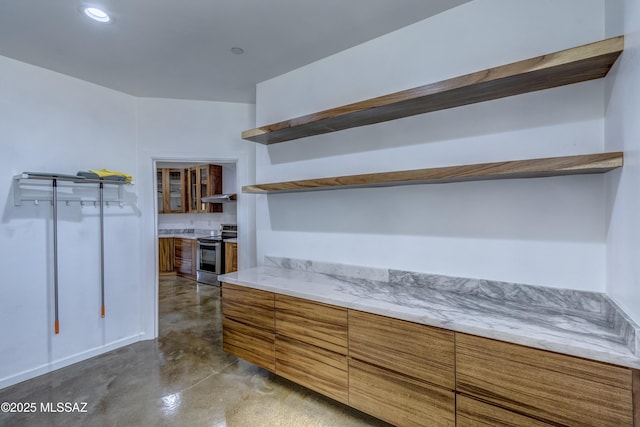 kitchen featuring stainless steel range with electric stovetop