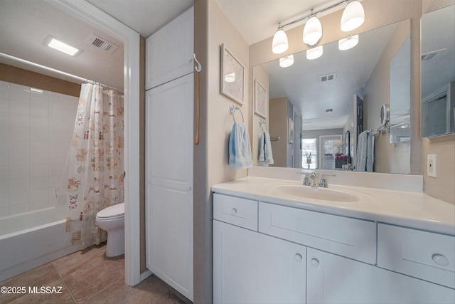 bathroom featuring toilet, vanity, shower / bath combo with shower curtain, and visible vents