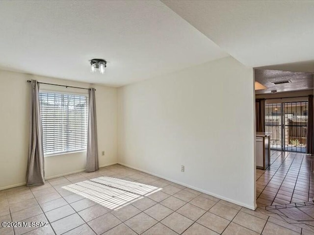 view of tiled empty room