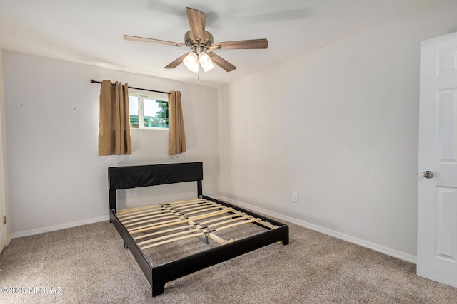 bedroom with light colored carpet and ceiling fan