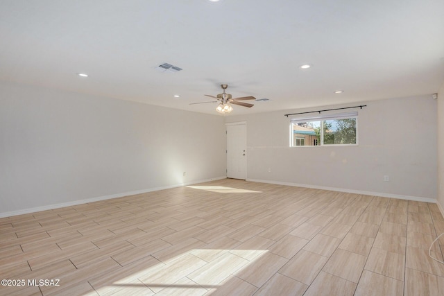 empty room featuring ceiling fan