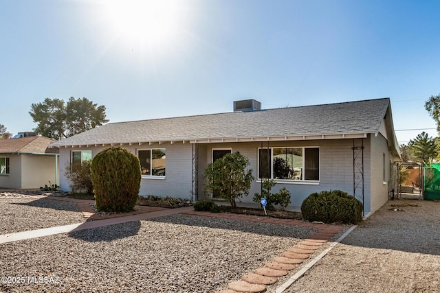 single story home with central air condition unit