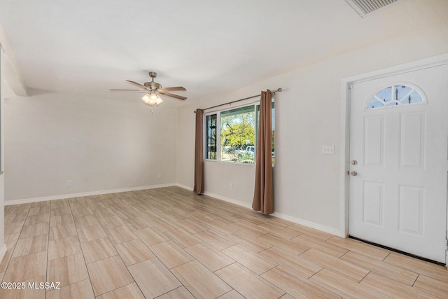 foyer with ceiling fan