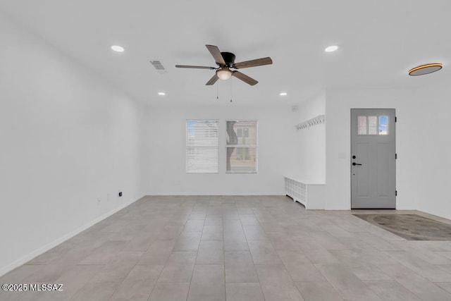 interior space featuring ceiling fan