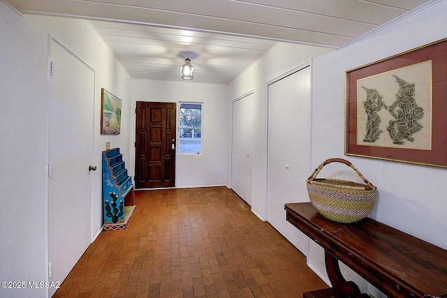 entryway with brick floor