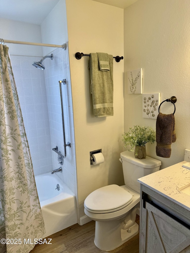 full bathroom featuring vanity, shower / bath combination with curtain, toilet, and wood finished floors