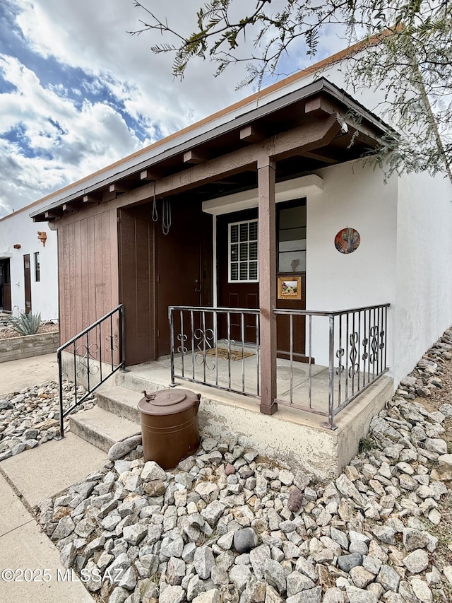 property entrance with a porch