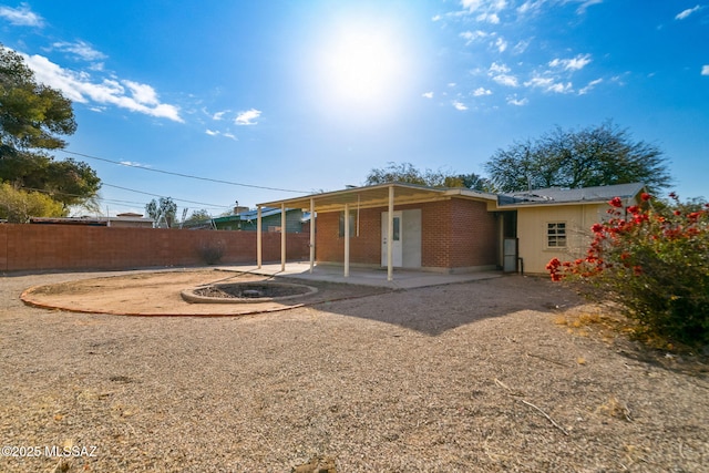 back of house featuring a patio