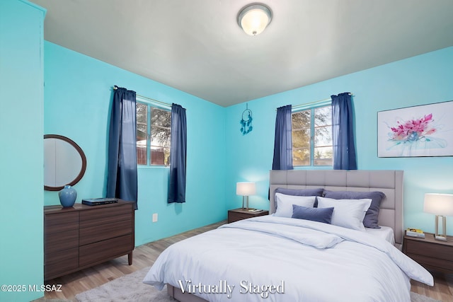 bedroom featuring light hardwood / wood-style floors