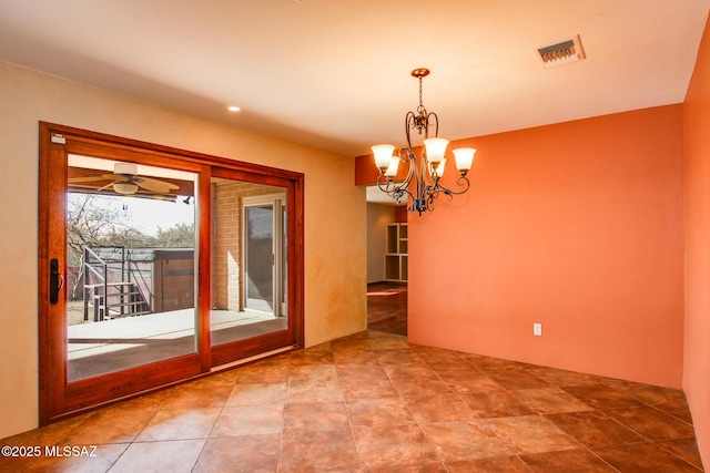 interior space featuring ceiling fan with notable chandelier