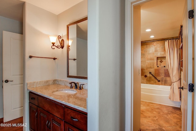 bathroom with vanity and shower / bath combo with shower curtain