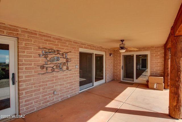 view of patio featuring ceiling fan