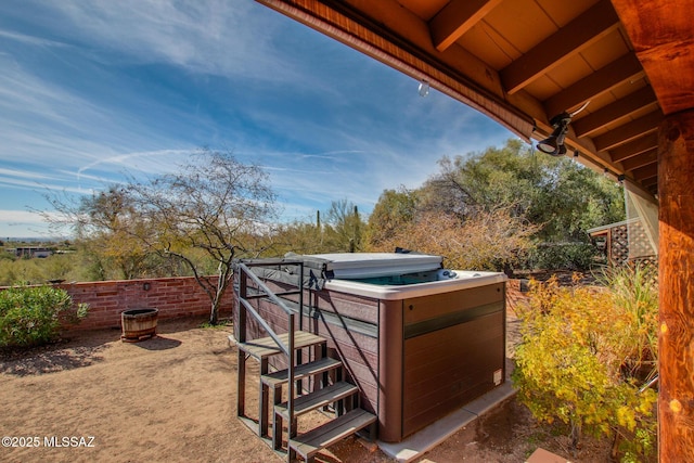 view of yard with a hot tub