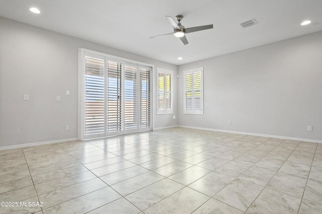 8270 W Spaulding St, Tucson, AZ 85743 - unfurnished room with a ceiling fan, light tile patterned floors, recessed lighting, and baseboards