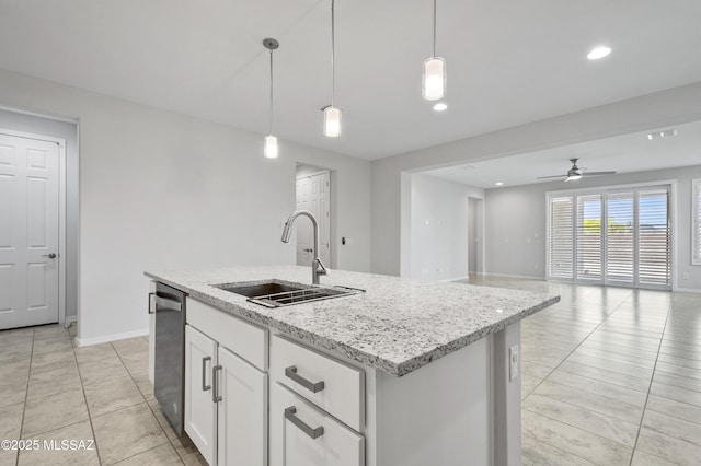 8270 W Spaulding St, Tucson, AZ 85743 - kitchen with a sink, stainless steel dishwasher, white cabinetry, ceiling fan, and decorative light fixtures