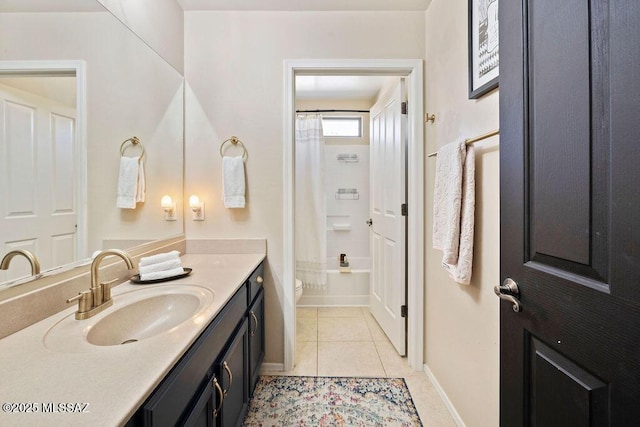 full bathroom with shower / bath combination with curtain, vanity, tile patterned floors, and toilet