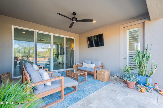 view of patio / terrace featuring ceiling fan and outdoor lounge area