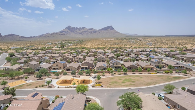 birds eye view of property featuring a mountain view