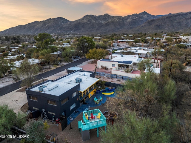 aerial view at dusk with a mountain view