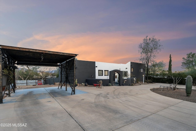 exterior space featuring a carport