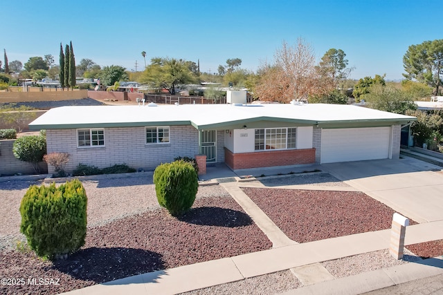 single story home with a garage