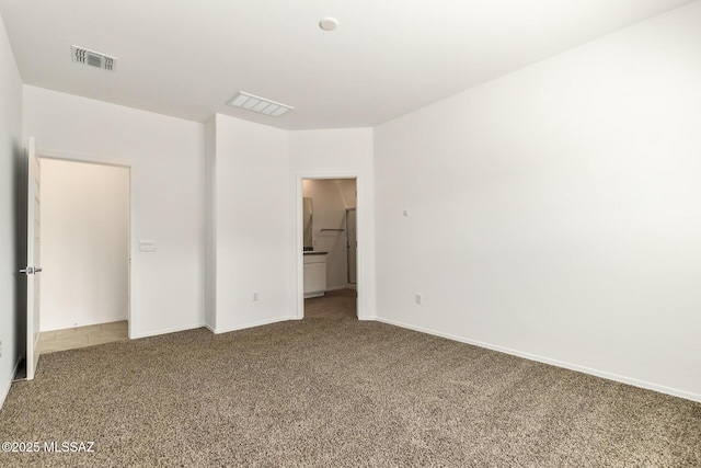 unfurnished bedroom with carpet