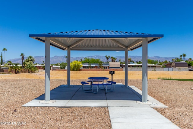 view of patio with a gazebo and a mountain view