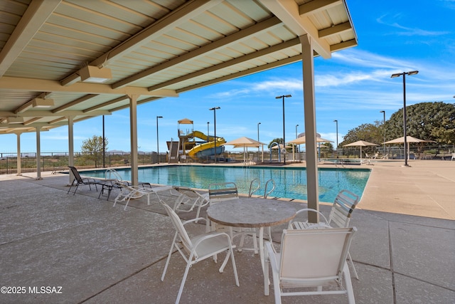 view of swimming pool featuring a patio