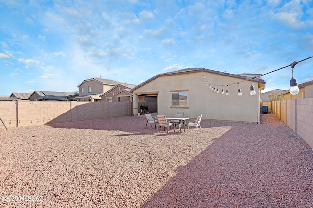 back of house featuring a patio