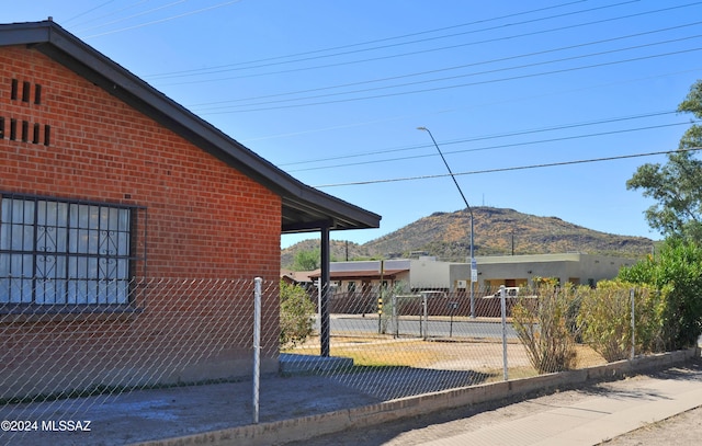 view of home's exterior featuring a mountain view