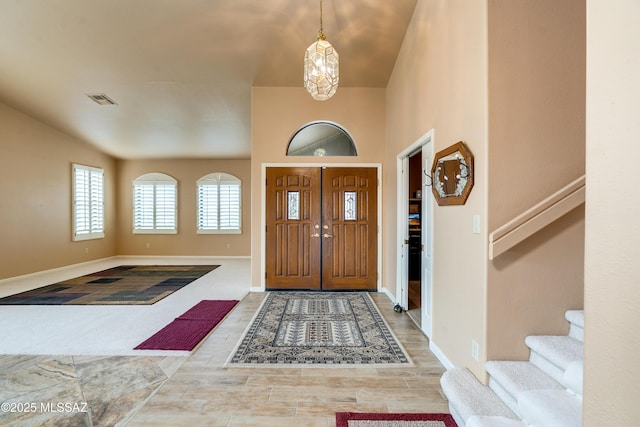 entryway with hardwood / wood-style floors
