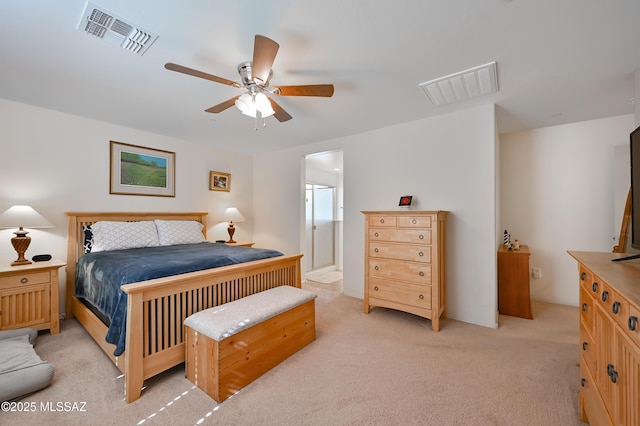 bedroom featuring ceiling fan and light colored carpet