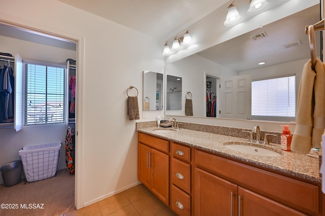 bathroom with vanity and tile patterned floors