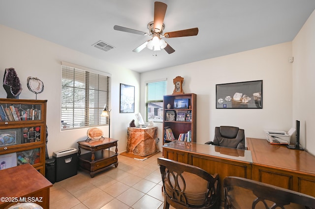 office space featuring light tile patterned flooring and ceiling fan