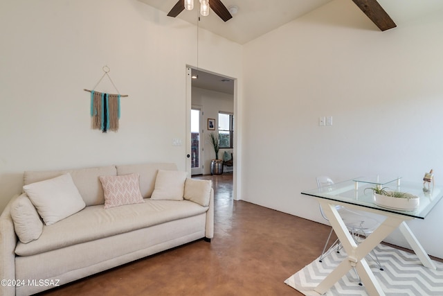 living room with ceiling fan and concrete floors