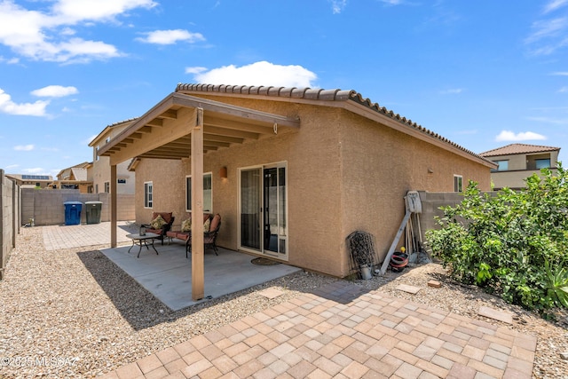 rear view of property with a patio