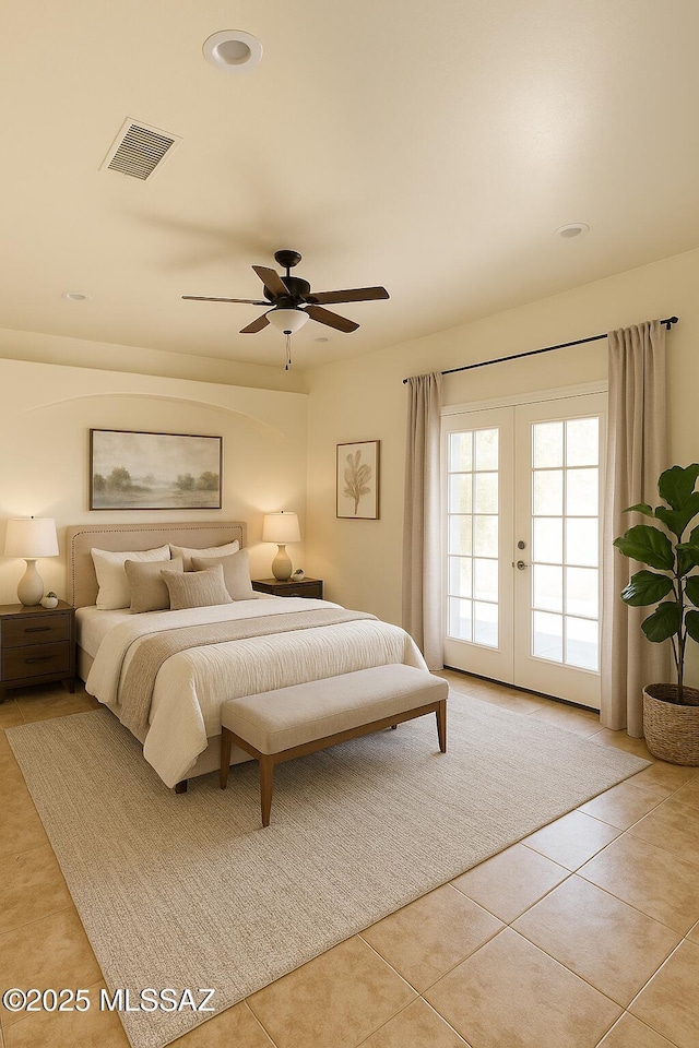 533 N Kino Springs Dr, Nogales, AZ 85621 - bedroom with access to exterior, french doors, light tile patterned floors, and ceiling fan