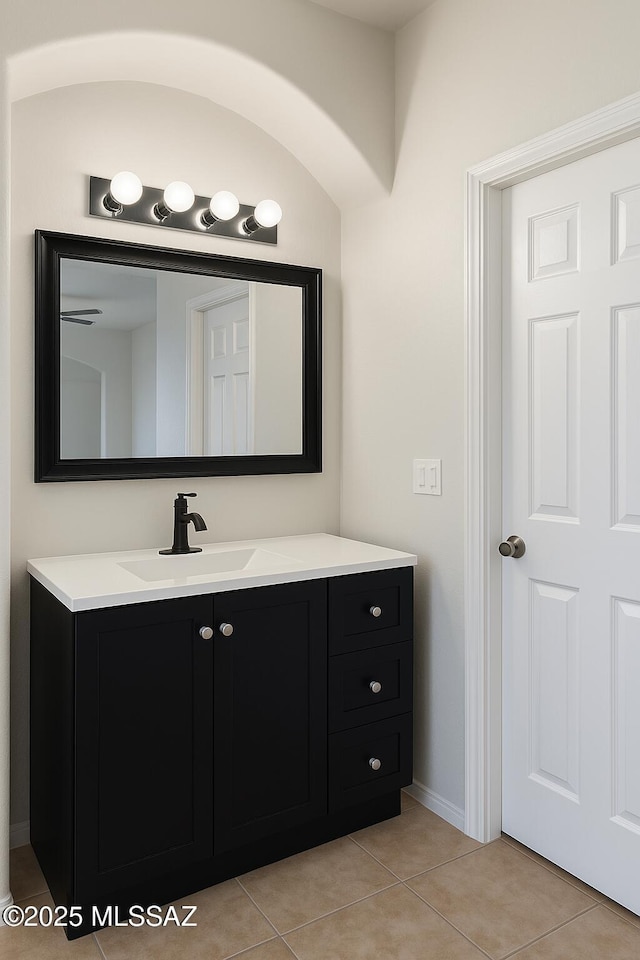 533 N Kino Springs Dr, Nogales, AZ 85621 - bathroom with tile patterned flooring, vanity, and baseboards