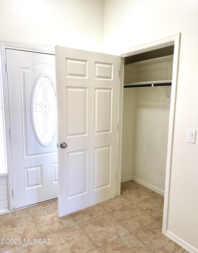 533 N Kino Springs Dr, Nogales, AZ 85621 - foyer entrance featuring light tile patterned floors and baseboards