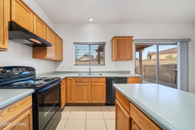 kitchen featuring sink, light tile patterned floors, and black appliances