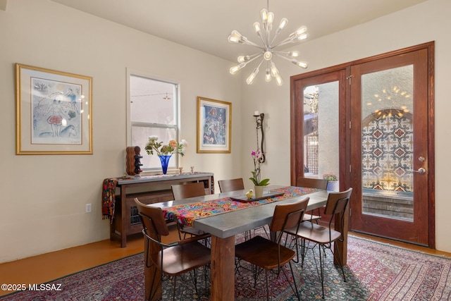 dining area featuring a chandelier