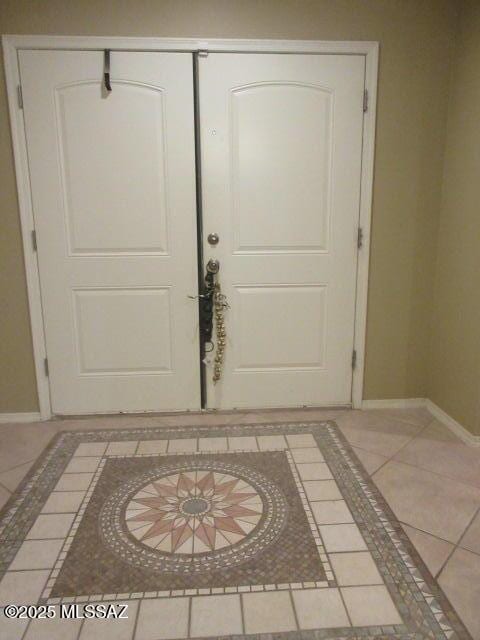 view of tiled foyer entrance