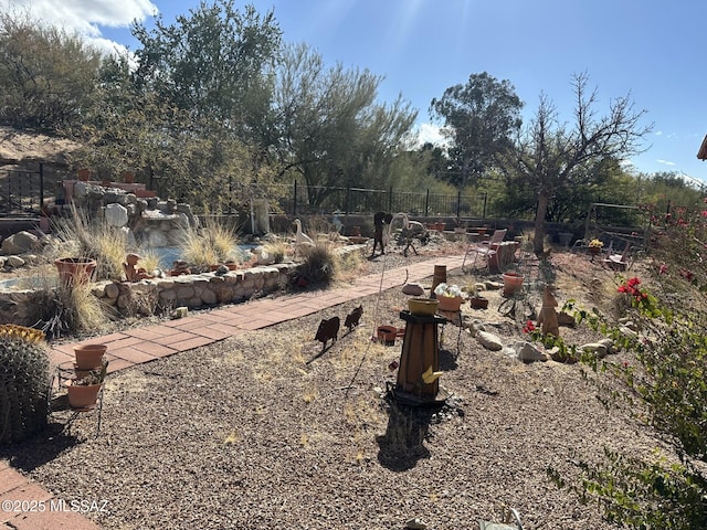 view of yard with fence