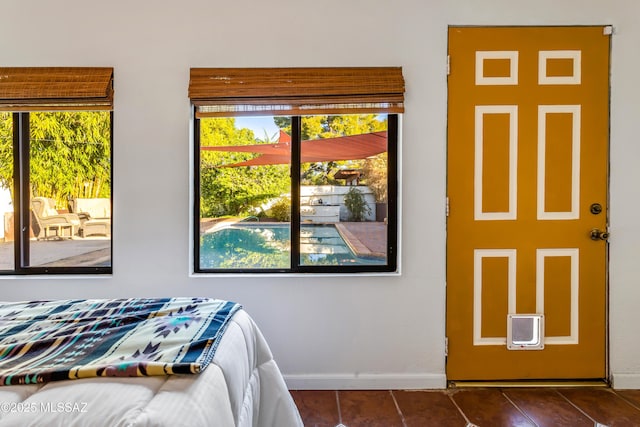bedroom featuring baseboards